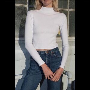 Brandy Melville Daniela Cotton Turtleneck Top in White.
